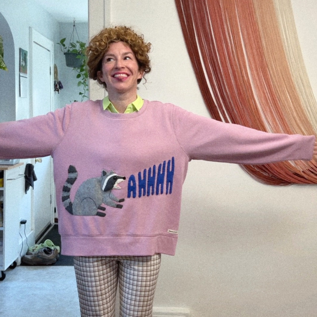 Screaming raccoon sweatshirt