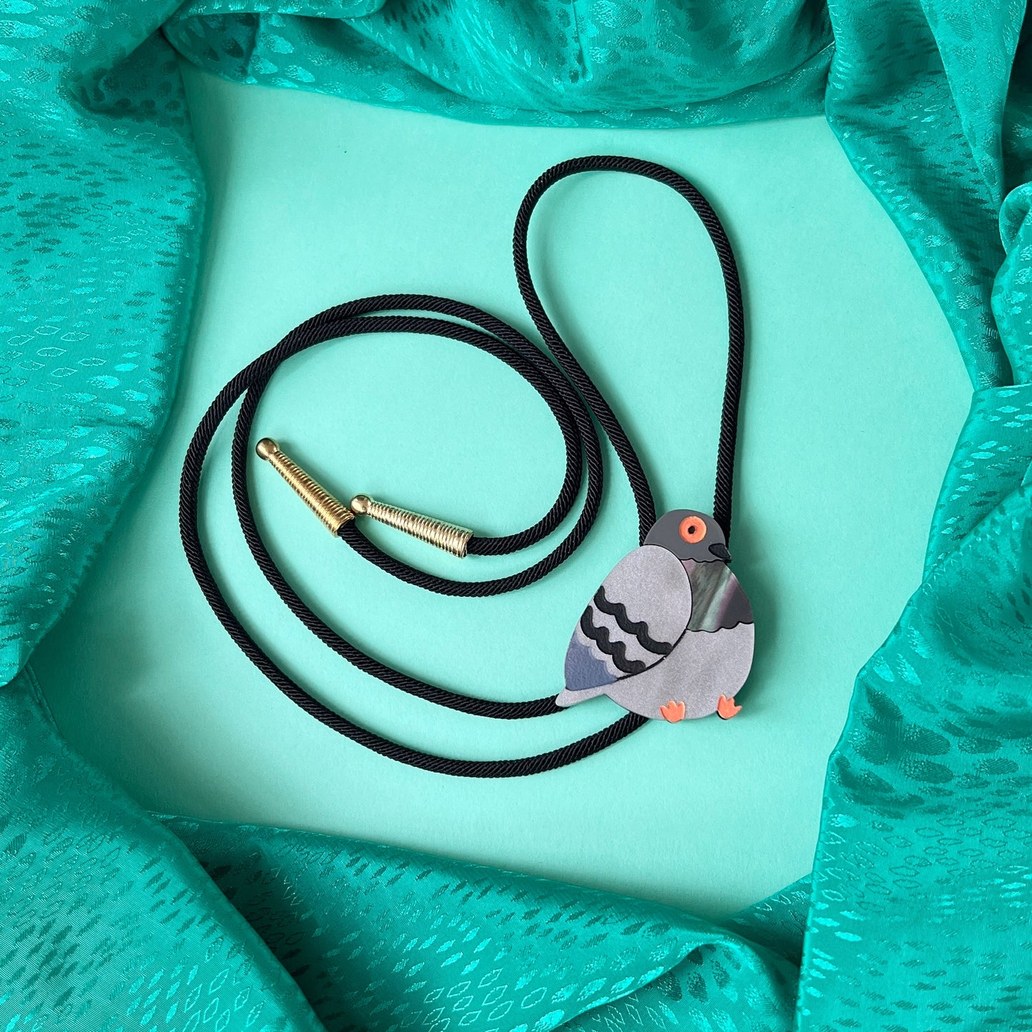 Chunky pigeon bolo tie