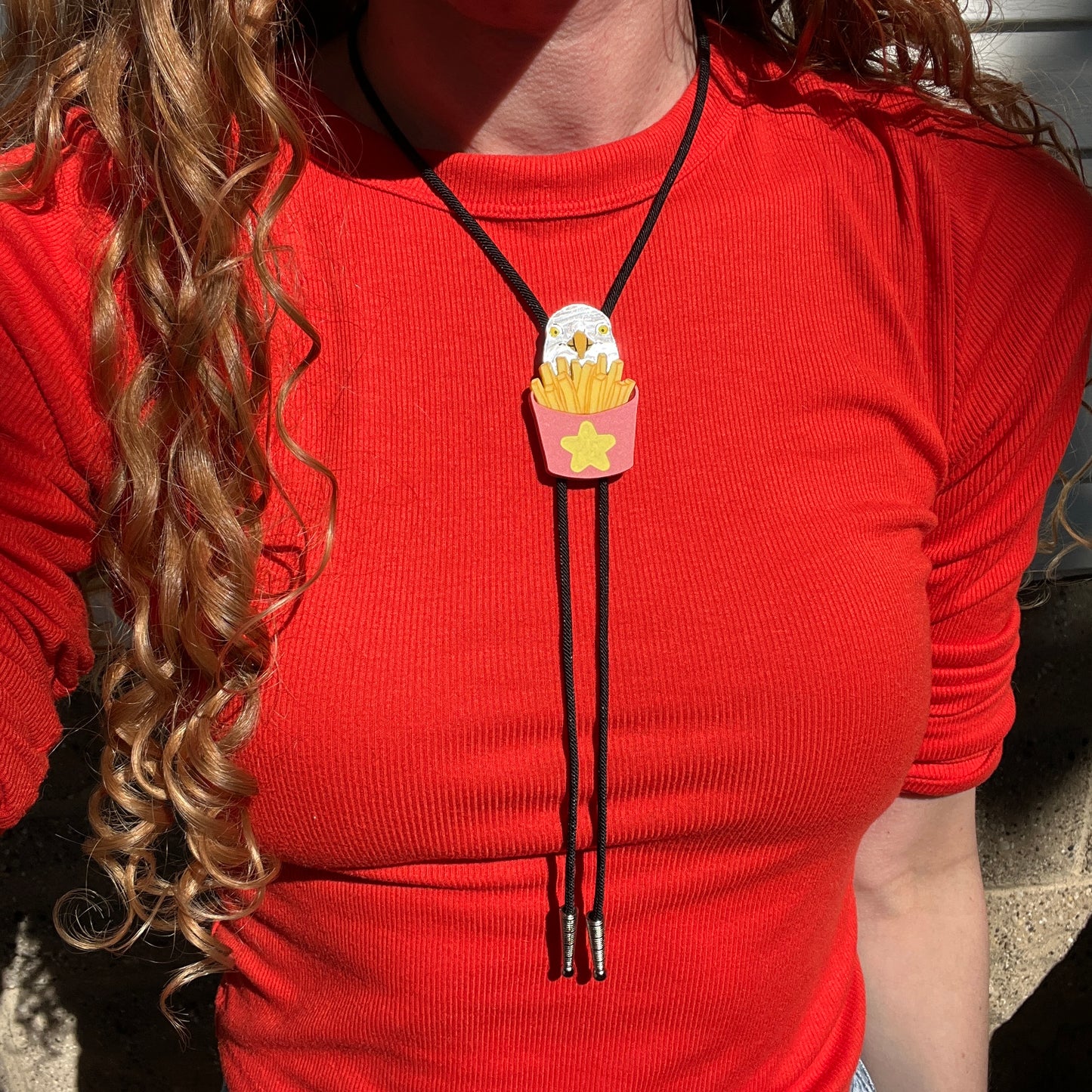 Seagull with fries bolo tie