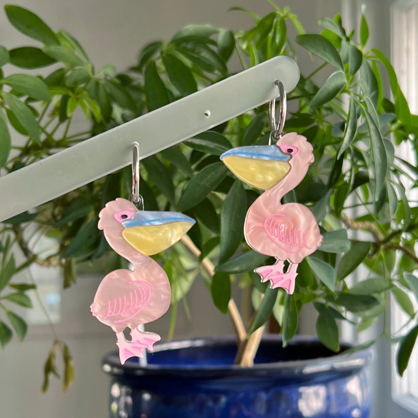 Pink pelican earrings