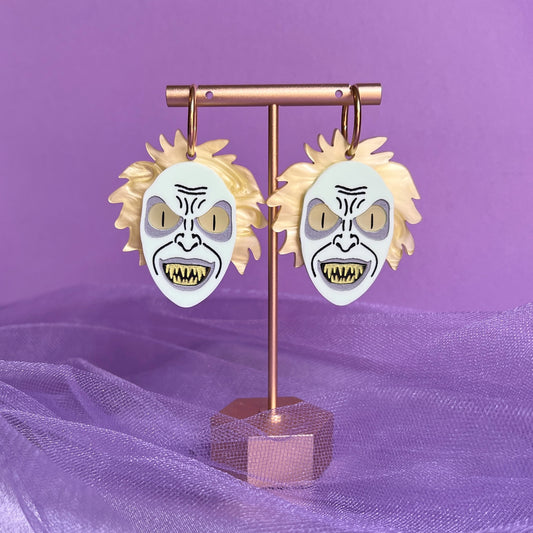 Snake juice earrings (eyes glow in the dark)