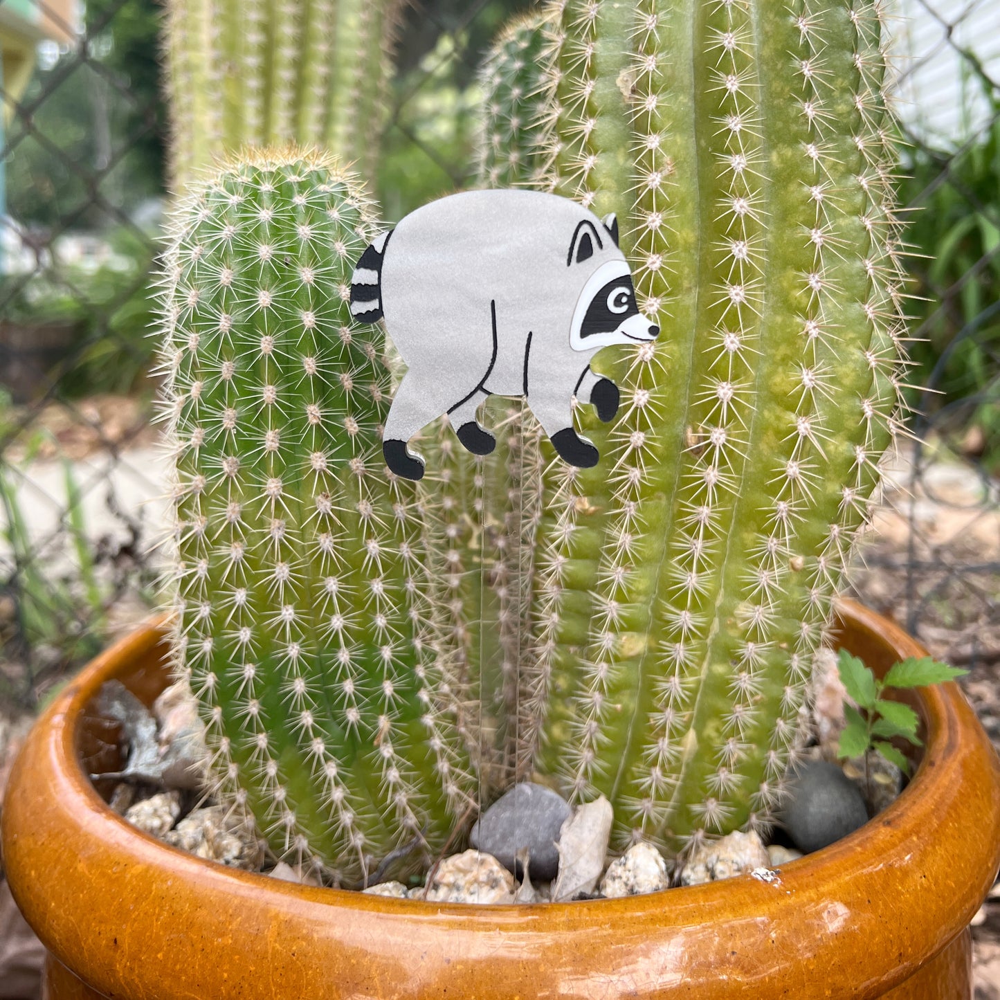 Jimothy raccoon plant stake