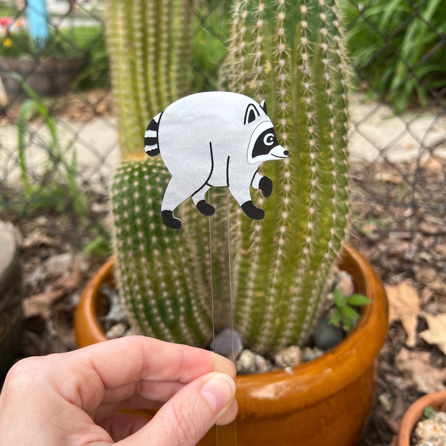 Jimothy raccoon plant stake