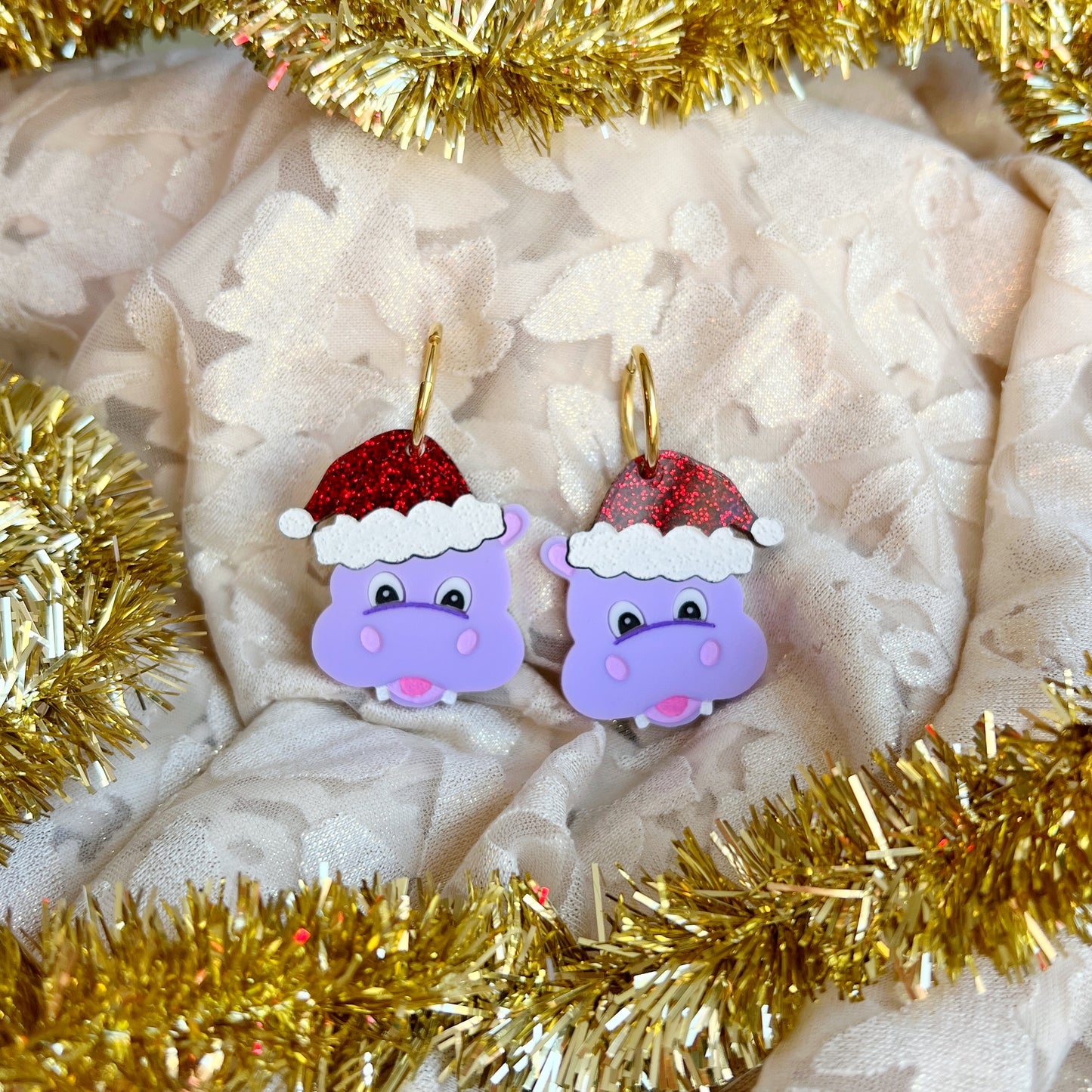 Festive hippo earrings