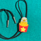 Seagull with fries bolo tie