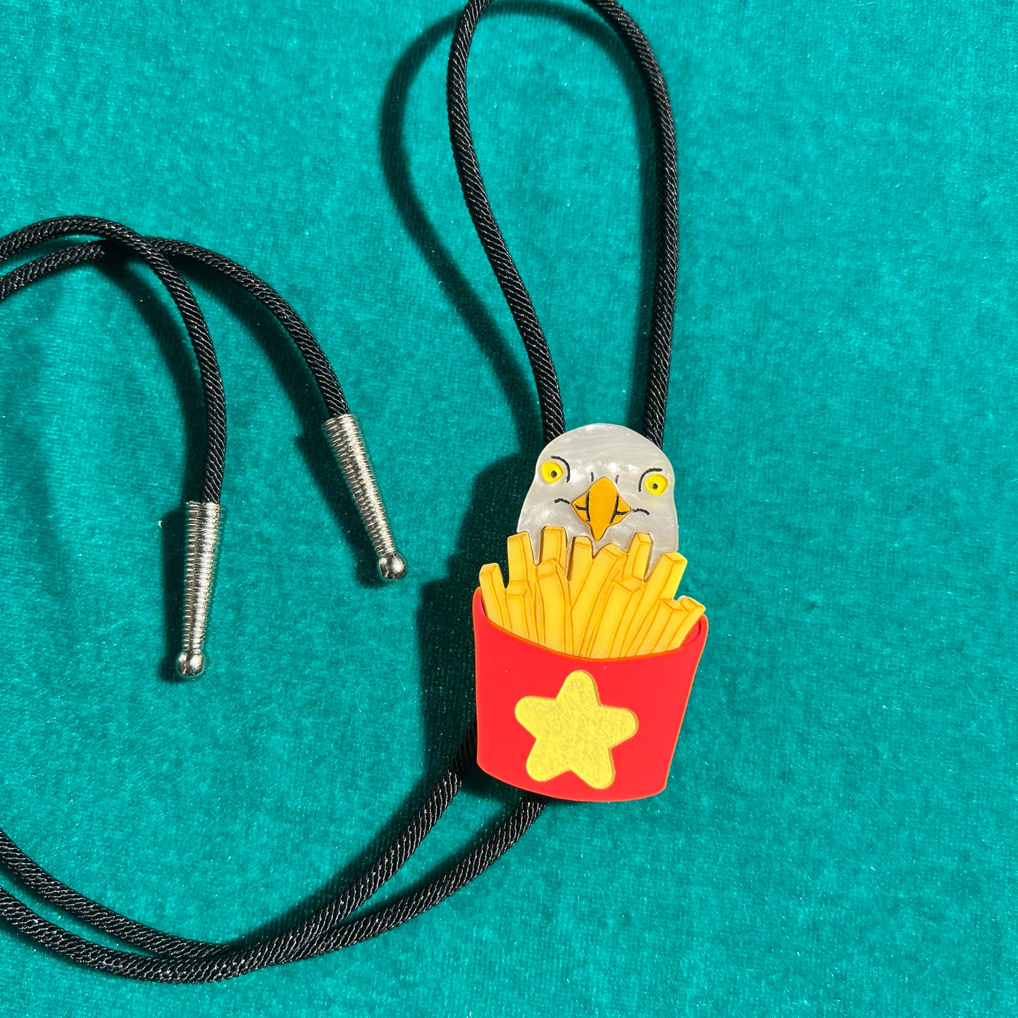 Seagull with fries bolo tie