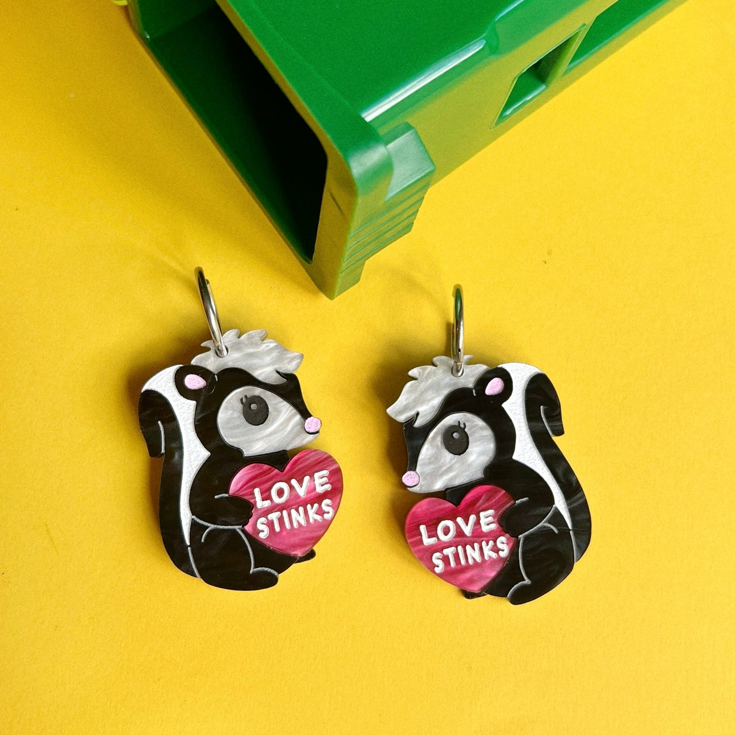Love stinks skunk earrings