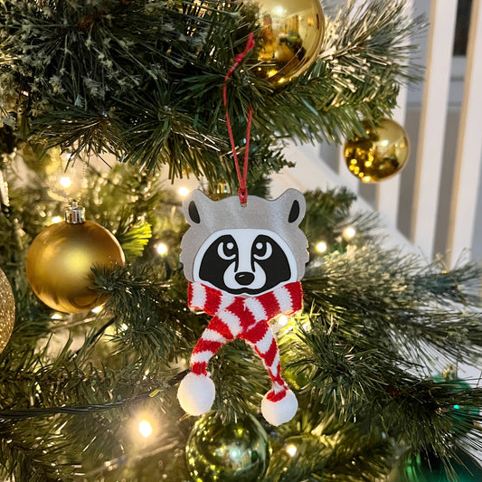 Cozy raccoon ornament