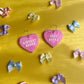 Pink library or used books heart earrings