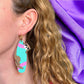 Mischievous otter earrings