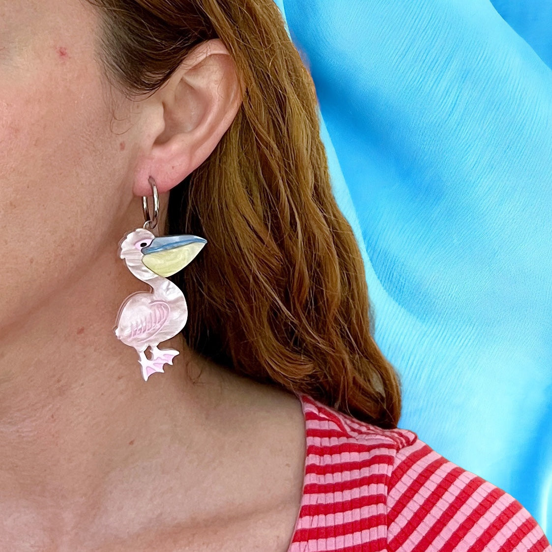 Pink pelican earrings