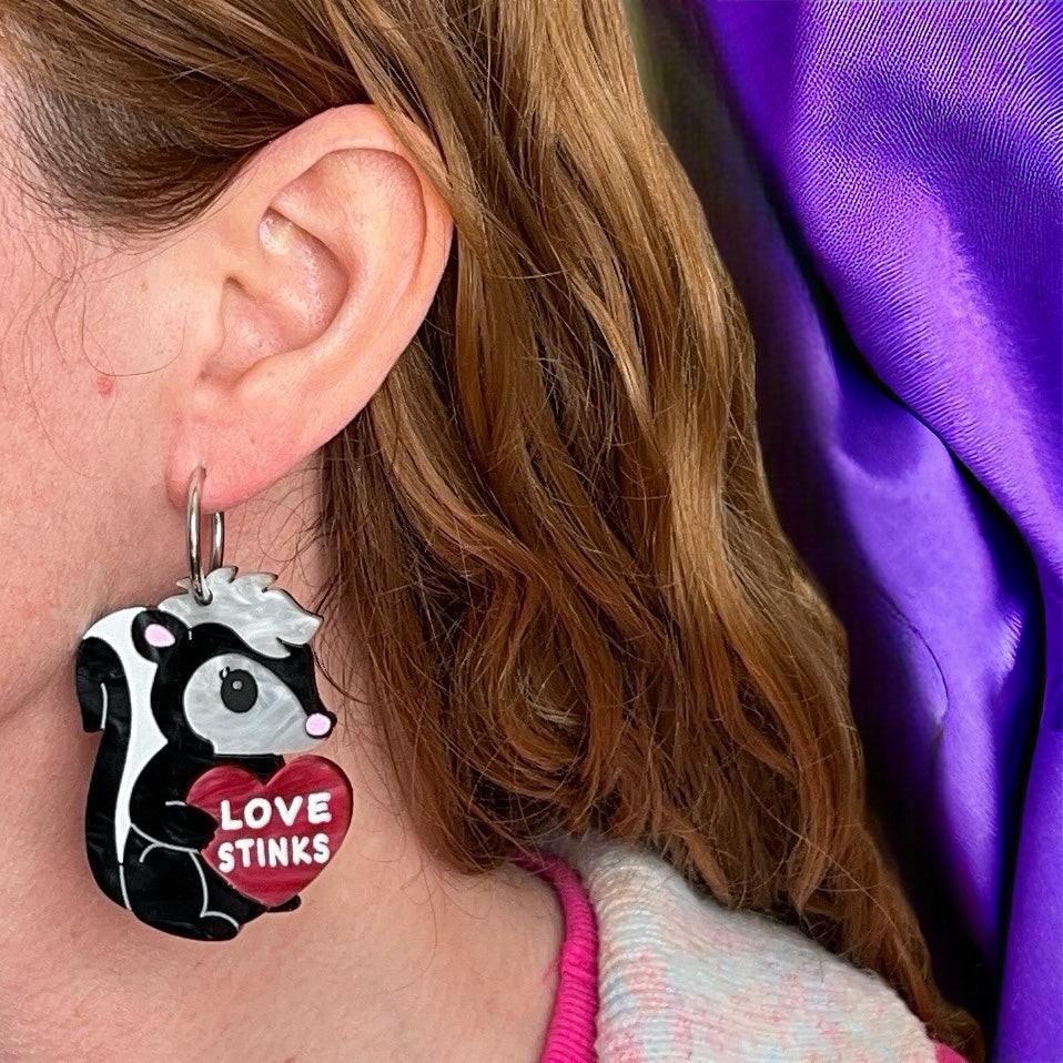 Love stinks skunk earrings