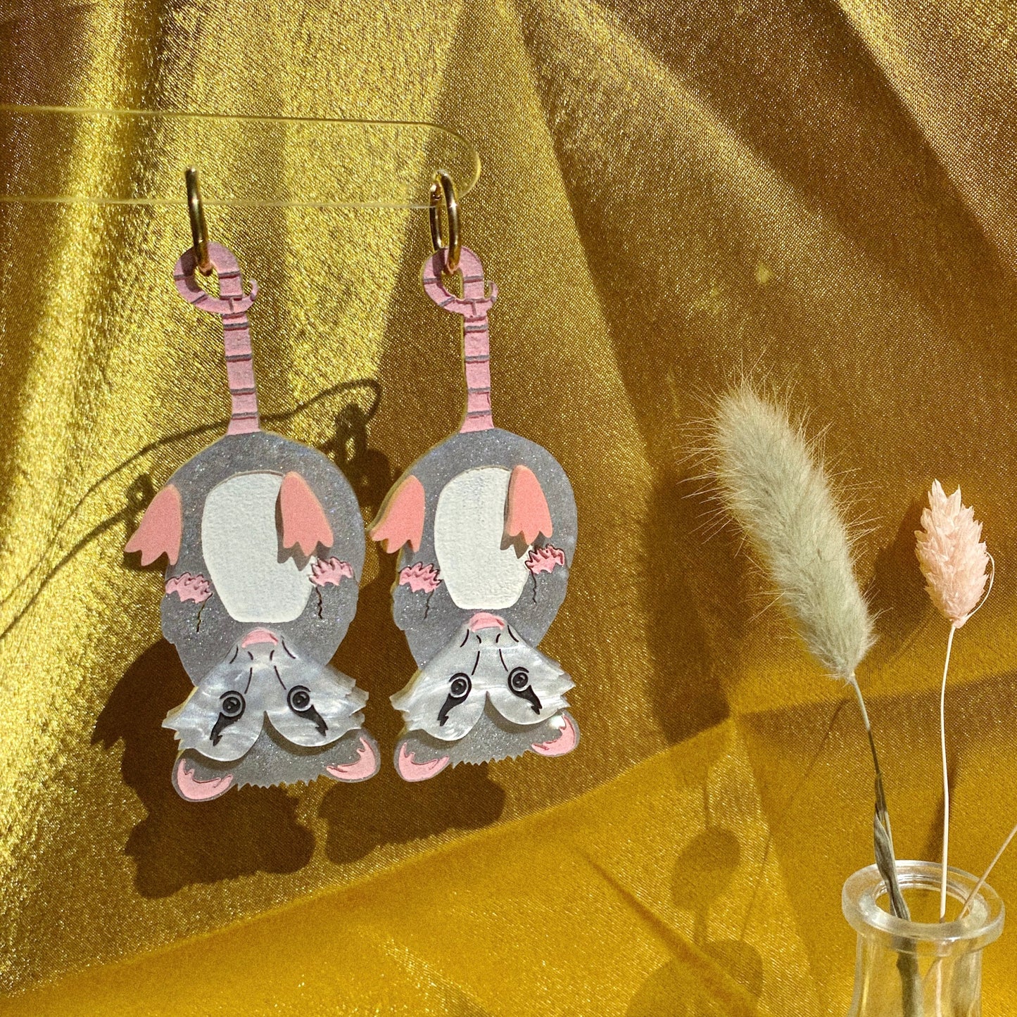 Hanging opossum earrings