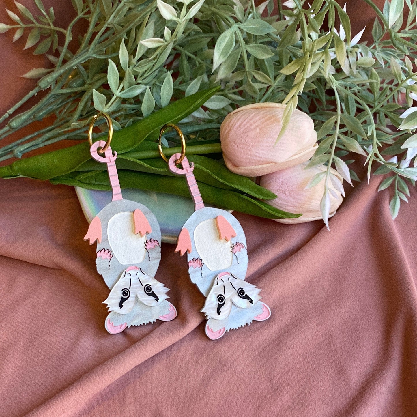Hanging opossum earrings