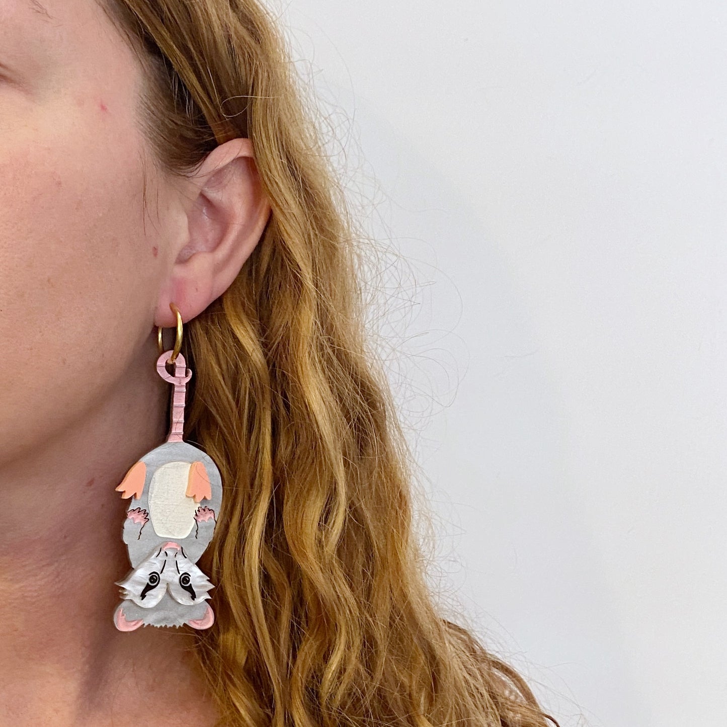 Hanging opossum earrings